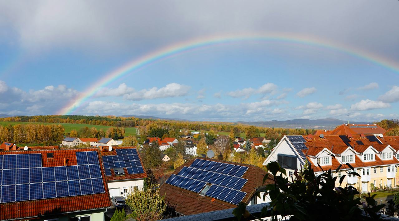 A rooftop solar array on a clear day